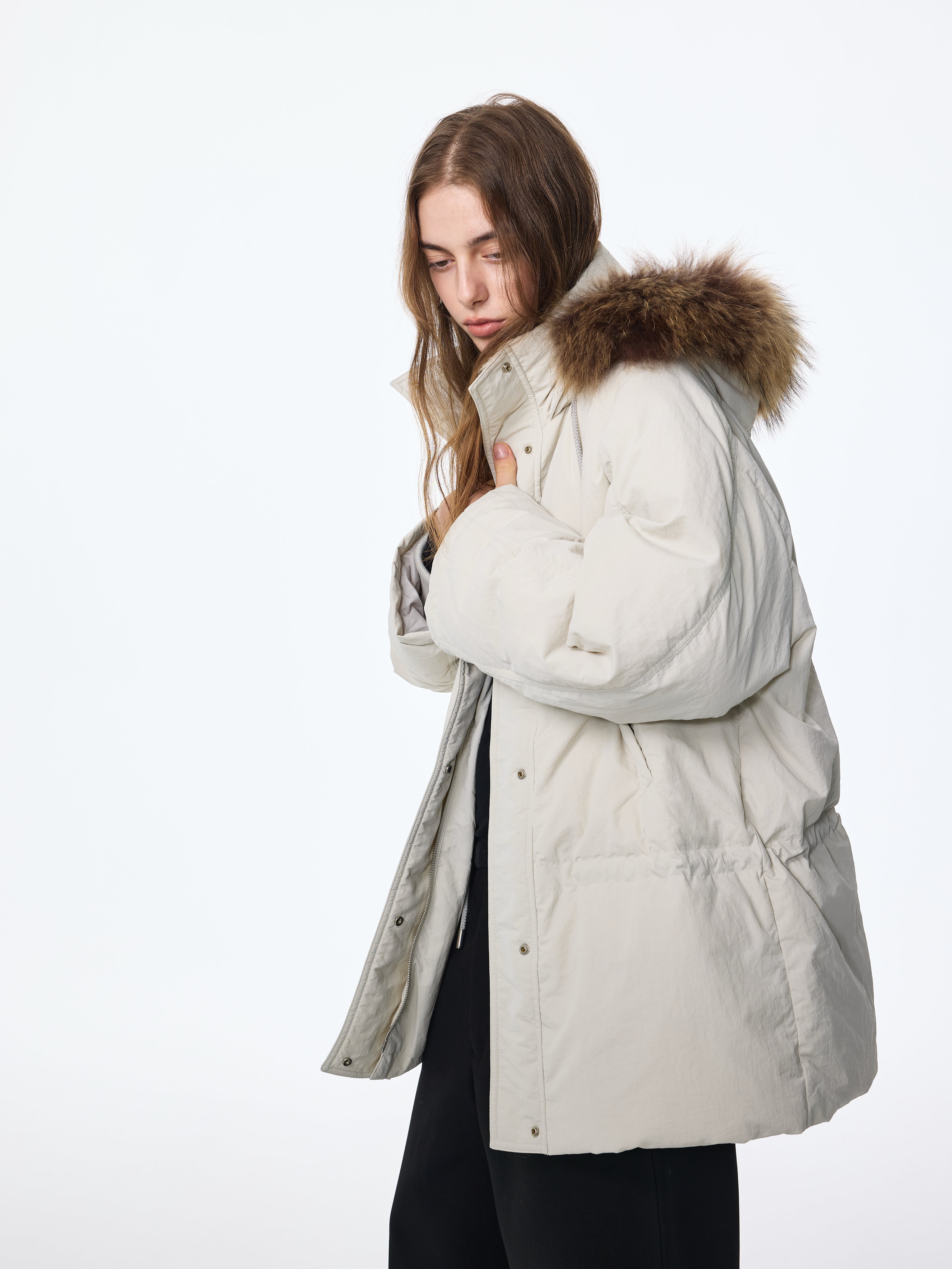 Doudoune à capuche bordée de fourrure de chien viverrin 