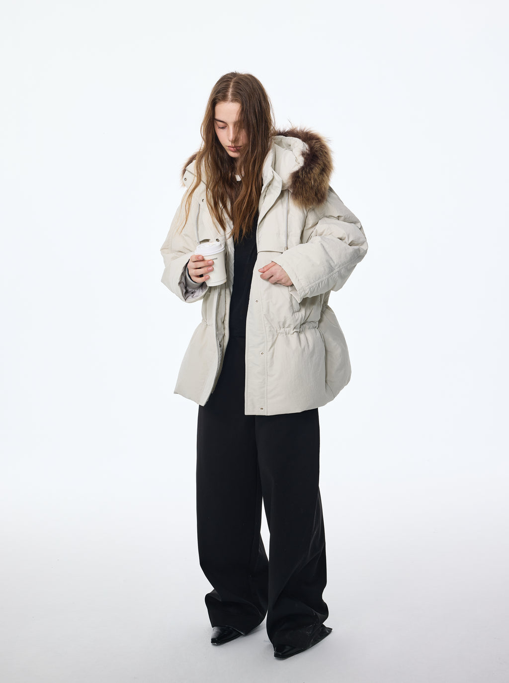 Doudoune à capuche bordée de fourrure de chien viverrin 